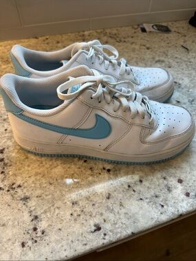 Nike Air Force 1 White Low-Top Sneakers with Light Blue Swoosh